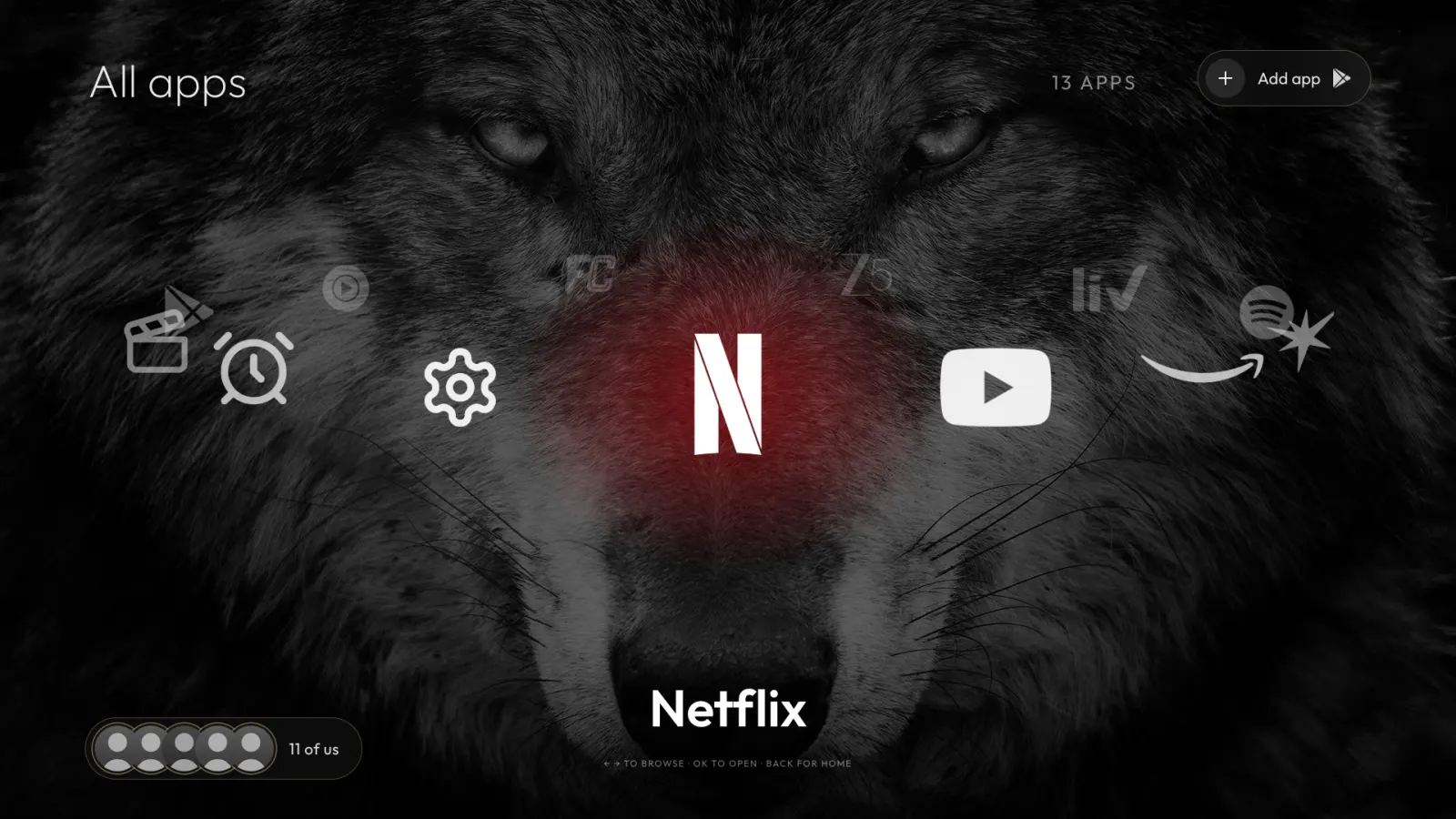 All apps: thirteen logos on a 3D ring over the wolf, Netflix in front.